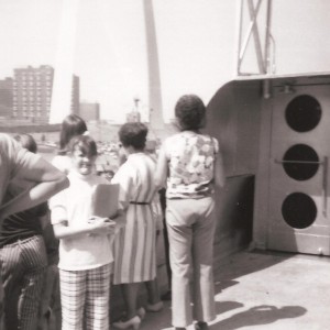 Linda Tate on the S.S. Admiral with the Gateway Arch in the background