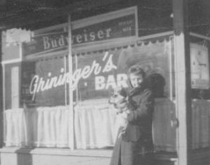 Louise Landsbury in front of Grininger's Bar